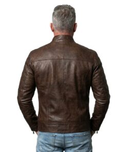 Rear view of a man wearing the Ionic black leather biker jacket, showcasing the clean back panel and shoulder epaulets.